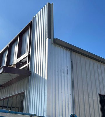 AP_vert-beamwork-on-storefront We build large scale metal buildings